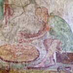 Abbildung 2: Töpferscheibe. Fresko aus Pompeji (Detail). Vor den Füßen des Töpfers liegt der Stab. Rieth 1965, Abb. 1. 